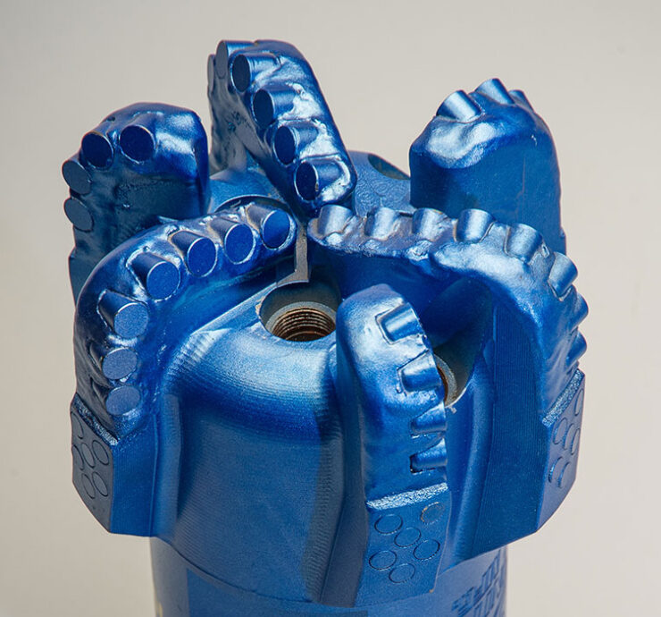 Blue PDC drill bit with polycrystalline diamond cutters. for the contact KS Bit page.