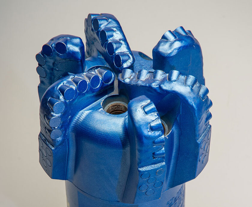 Blue PDC drill bit with polycrystalline diamond cutters. for the contact KS Bit page.