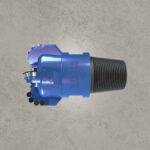 Blue PDC drill bit with diamond cutters and threaded shank.