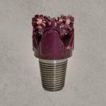 Mill tooth tricone drill bit with open bearing and steel milled teeth.